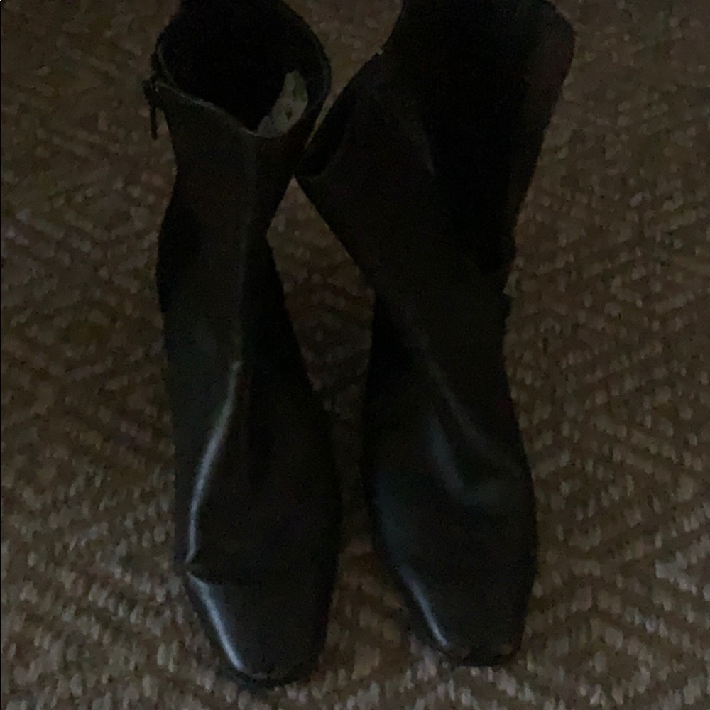 Brown leather and black boots